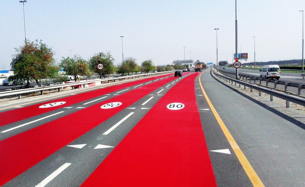 rak-road-painted-in-red-color-to-highlight-speed-limit